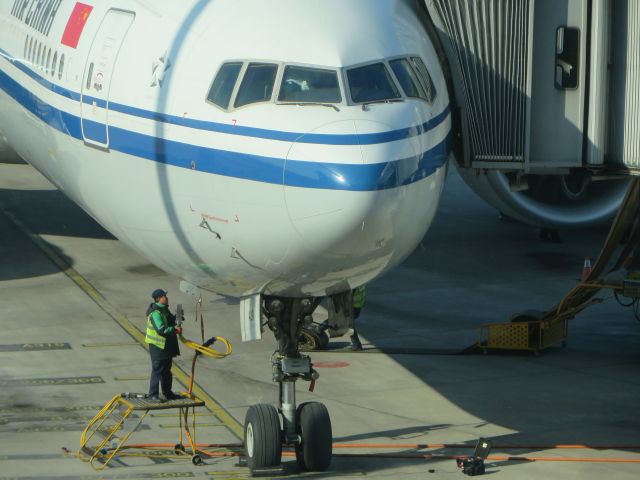 Boeing 777-200 (B-1429) - A sunny afternoon in Terminal 3 of Beijing Capital international airport. A great moment for the 777 and the ramp.