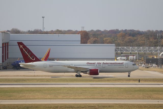 BOEING 767-300 (N486AX) - Omni Air 767 arrival 23R. Chartered by US Military.