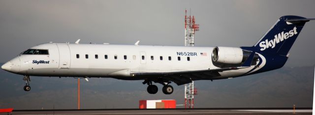 Canadair Regional Jet CRJ-200 (N652BR) - Landing on 16L.