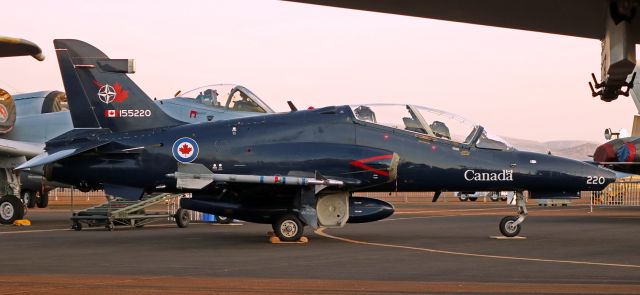 Boeing Goshawk (15-5220) - When the sun first came up over the military aircraft static display area at the 2017 Reno Air Races two weeks ago, there was a neat surprise hidden in the early AM shadows.  Three Royal Canadian Air Force aircraft were on display.  This one, a BAe (British Aerospace) Systems CT-155 Hawk (155220, 419th Tactical Fighter Training Squadron, CFB Cold Lake, Alberta ... CYOD), is snapped from under the wing of an Idaho ANG Warthog (78-625).