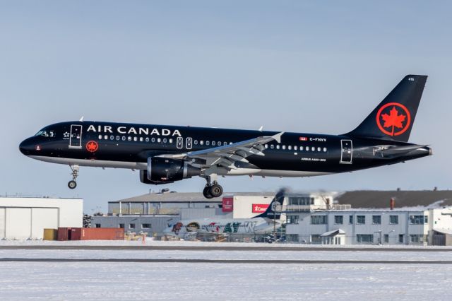 Airbus A320 (C-FNVV) - ACA7106 on final for 35L carrying the Seattle Kraken.