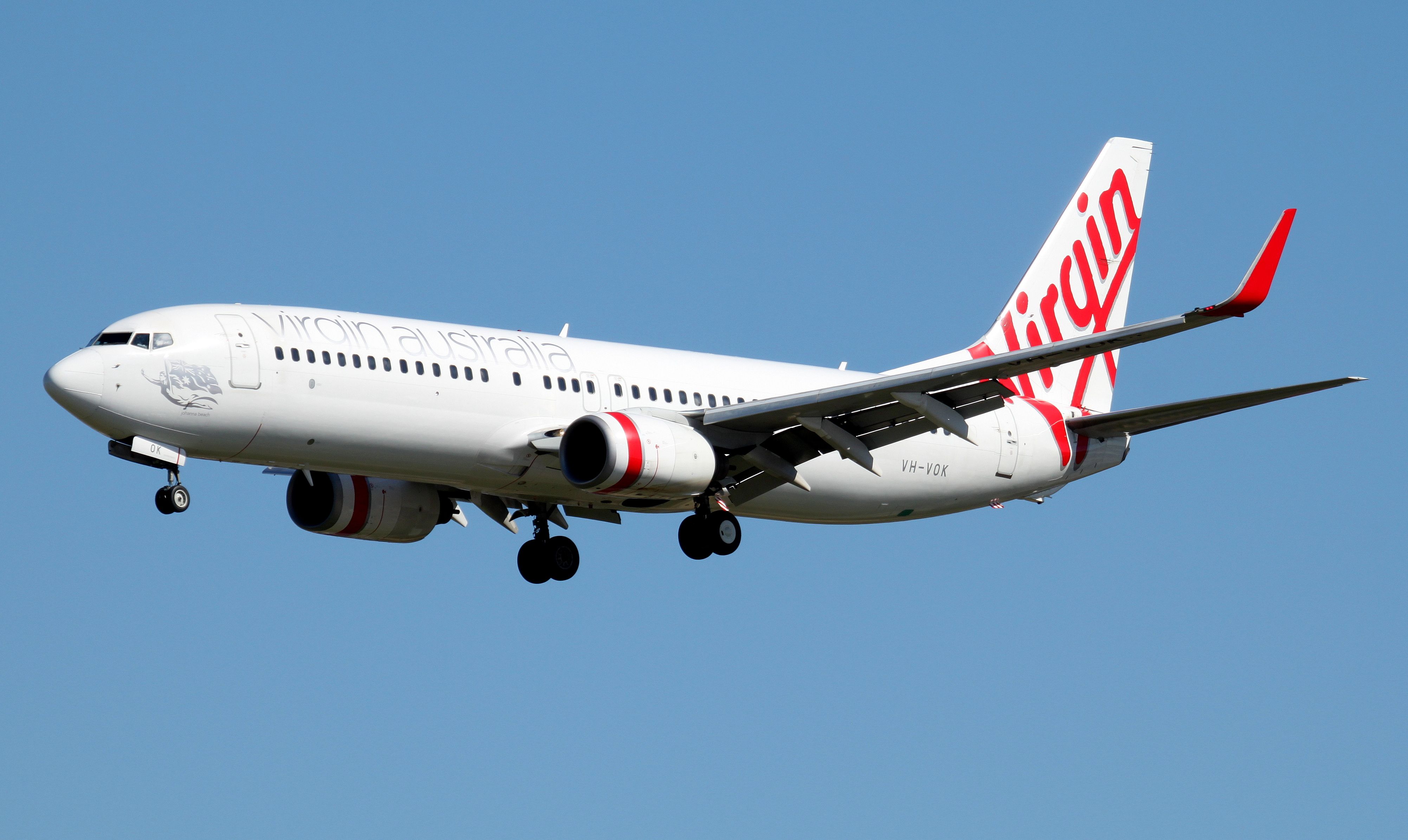 Boeing 737-800 (VH-VOK) - Johanna Beach Short Final To Rwy 16R