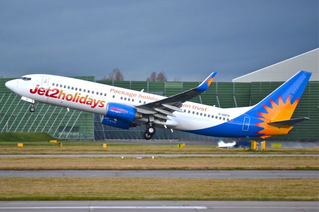 Boeing 737-800 (G-GDFD) - Rotating into a fairly strong crosswind.