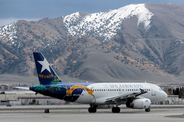 Airbus A319 (N822AW) - AWE Flt. 16, dressed in Nevada "Battle Born" livery, begins her departure roll down Reno Tahoe Internationals runway 16R for its flight to Phoenix Sky Harbor International (KPHX).