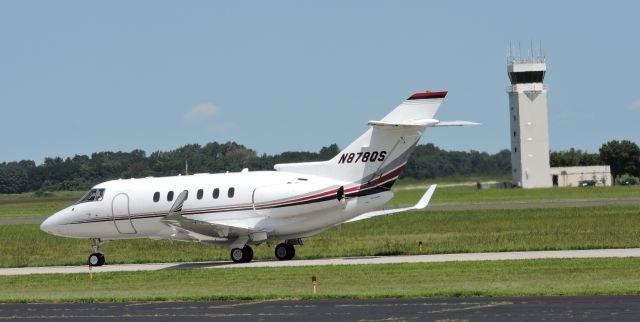 Hawker 800 (N878QS) - Taxiing just past the Control Tower getting ready for take off in the summer of 2017.