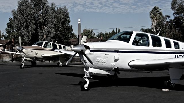 Beechcraft Bonanza (36) (N527TC) - Two Beechcraft B36TC Bonanzas sitting on the ramp at Reid Hillview Apt. They are both for sale at: a rel=nofollow href=http://www.laffertyair.comwww.laffertyair.com/a