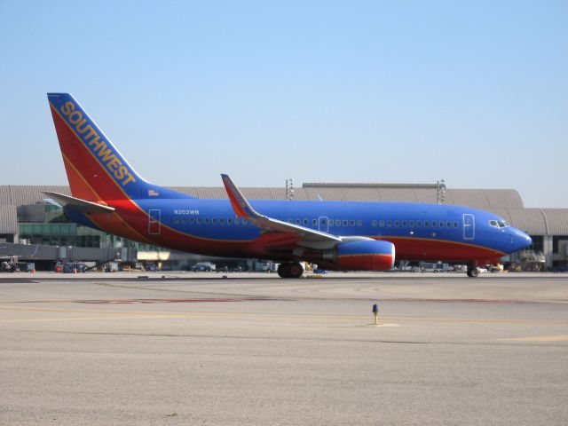 Boeing 737-700 (N203WN) - Holding on RWY 19R