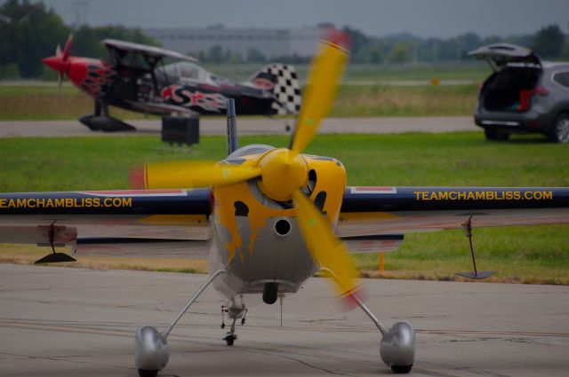 ZIVKO Edge 540 (N423KC) - Kirby Chambliss at the Central Iowa Airshow entertained the audience in his Zivko Edge as part of the Red Bull Air Force.  His performance was awesome and showcased his skills in the aircraft.  Photo taken August 25, 2019 with Nikon D320 at 250mm.