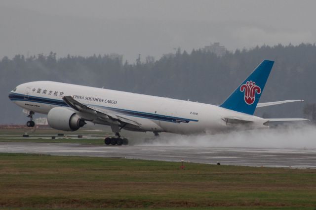 BOEING 777-200LR (B-2042) - China Southern Cargo 77F drying up the runway heading for Shanghai.