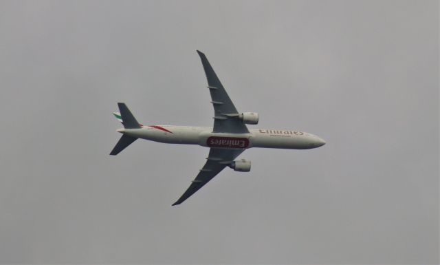 BOEING 777-300ER (A6-EQI) - 7/23/22 Emirates flight from DXB makes it's turn for final to MCO just a few thousand feet above SFB