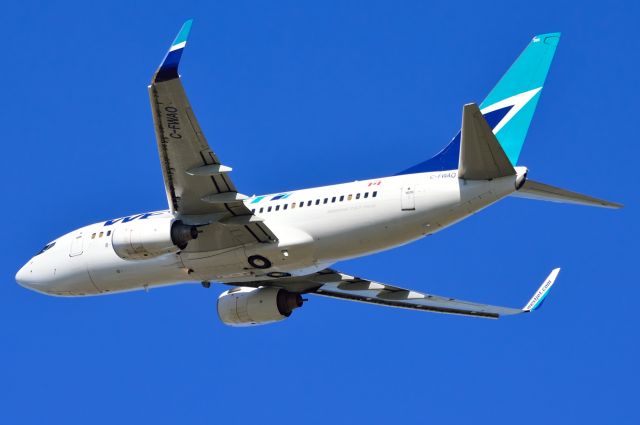 Boeing 737-700 (C-FWAO) - WestJet B737-700 C-FWAO Departing KDFW 10192013