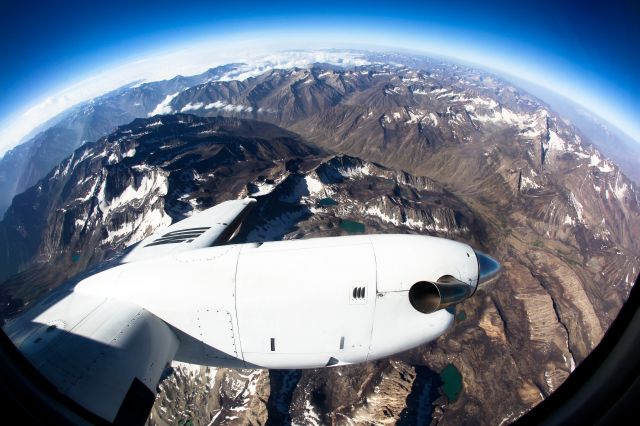 ZS-OSH — - BE20 ZS-OSH banks over the Hindu Kush Mountains in North Eastern Afghanistan.