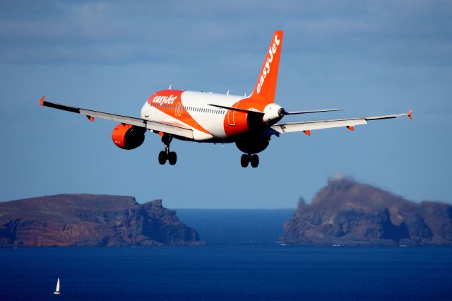 Airbus A319 (G-EZGG) - From Gaula hill. Approching Funchal Airport.