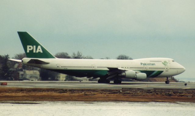 Boeing 747-200 (AP-BAK) - Pakistan (PIA) B747-240BM (AP-BAK) a JFK weather diversion to Boston Logan Airport on March 6, 2004.