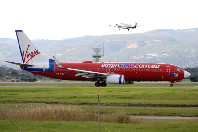 Boeing 737-800 (VH-VUL) - On taxiway heading for take-off on runway 05. Thursday, 19 June 2014.