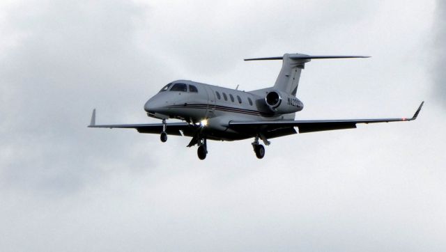 Embraer Phenom 300 (N427QS) - On final is this 2018 Embraer Phenom EMB-505 in the Spring of 2019.