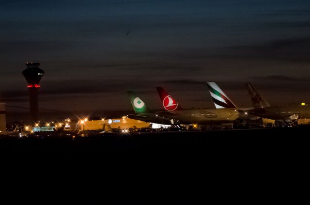 — — - Toronto YYZ at night, heavy waiting for departure.