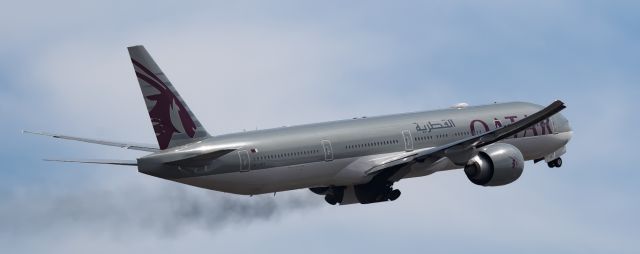 BOEING 777-300ER (A7-BEE) - These black smokes were not coming from engine, but from tires; they are actually the dust on the runway.