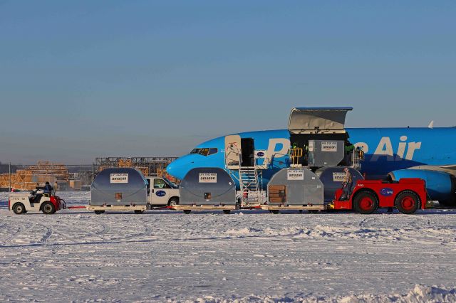 Boeing 737-800 (N8011A) - A little help please… The snow and ice made it challenging while unloading the freight so they had to bring out the big guns for a boost. on 25 Jan 2022.