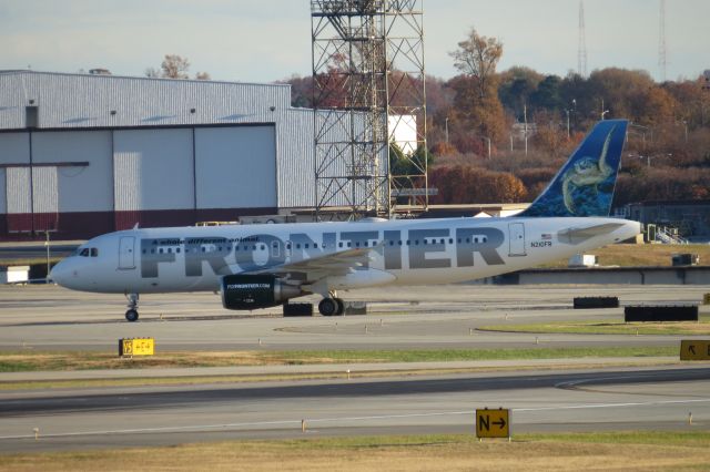 Airbus A320 (N210FR) - Taken Nov. 26, 2014 from airport overlook, headed to gate.