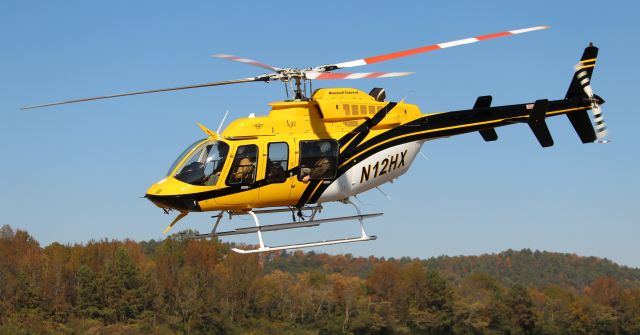 Bell 407 (N12HX) - A Helicopter Express Bell Eagle 407HP departing Anniston Regional Airport, AL - November 7, 2023.