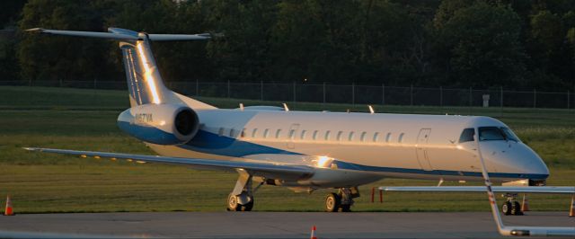 Embraer ERJ-145 (N67VA) - Parked at Signature Flight Services Sat morning 7-10-21