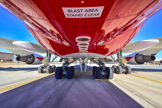 Boeing 747-200 (N744ST) - Global Super Tanker fresh out of maintenance at KVCVbr /Where you do NOT want to be standing when the system is pressurized and the valves open.  This plane can disperse 19,500 gallons of retardant in under 15 seconds!