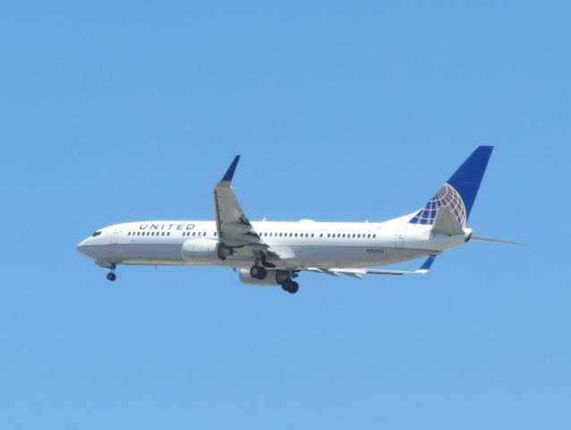 Boeing 737-900 (N75426) - This airplane is performing a go around and is about to put its gear up. It landed successfully on its 2nd attempt.