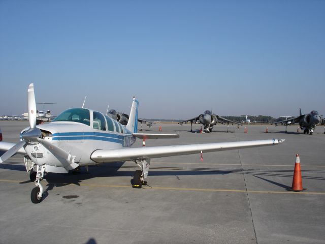 Beechcraft Bonanza (36) (N7747R) - Songbird among Hawks!