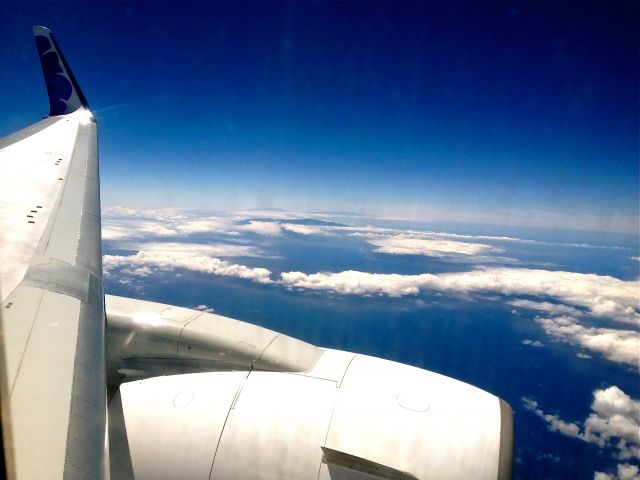 N582HA — - View from 18A with the islands of Hawaii and Maui in the background.