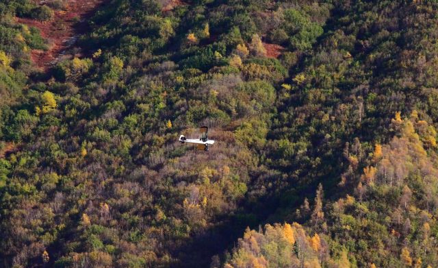 — — - Enjoying the Fall colors of Alaska via the air