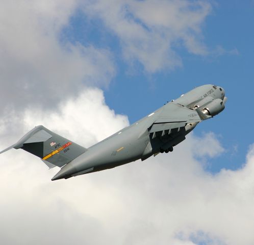 — — - C-17 at Air Show weight (180,000 lbs), does a high angle departure.