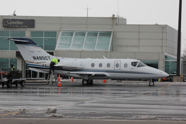 Beechcraft Beechjet (N495CT) - A cold and icy morning at DIA.