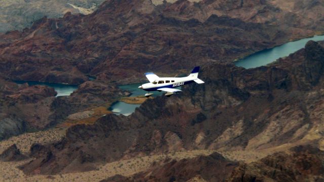 Piper Cherokee (N4184V) - Over the Colorado river on Arizona-California border.