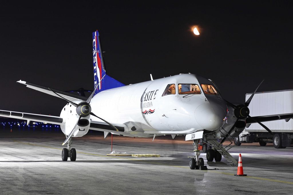 Saab 340 (N329AE) - A little moonlight over a Saab340BF on the ramp just before departing for Akron-Canton Rgnl (KCAK) at zero-dark-thirty this morning, 20 Jul 2022. 