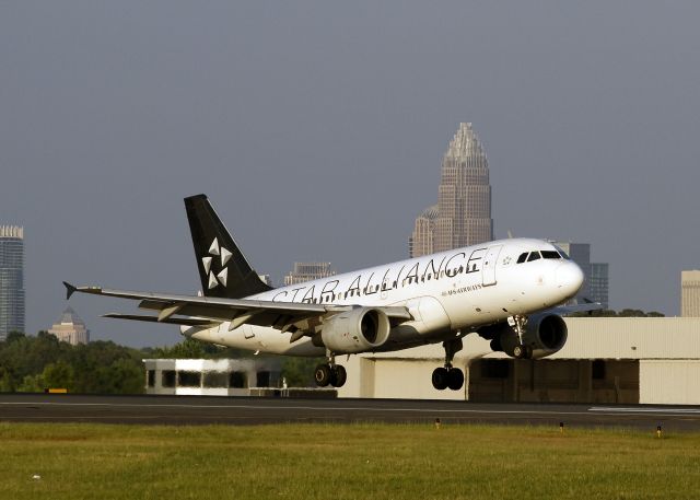 Airbus A319 (N702UW) - Landing on runway 5 in Charlotte, North Carolina USA 16 June 2011