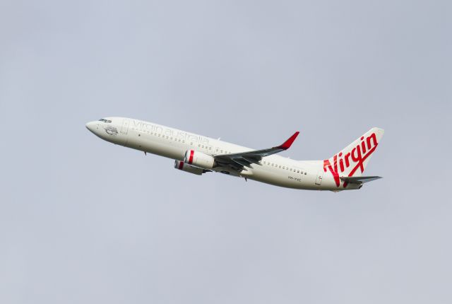 Boeing 737-800 (VH-YVC) - 'Jetty Beach' departing RWY 19 on the 8/2/14