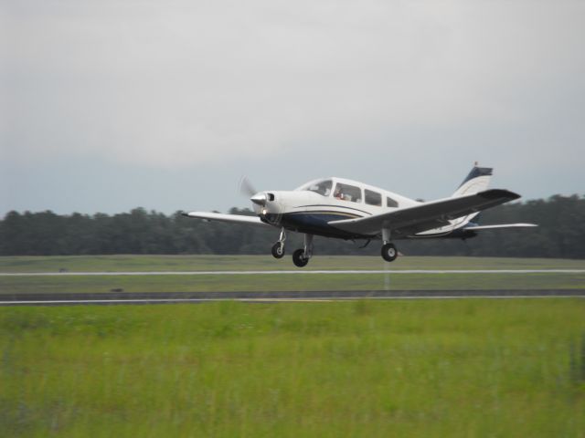 Piper Cherokee (N153SM) - Warrior 3SM landing RWY36 at TLH.