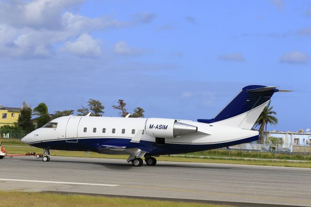 M-ASIM — - M-ASIM being towed to the main ramp at TNCM St Maarten