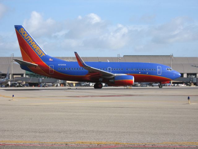 Boeing 737-700 (N734SA) - Holding on RWY 19R