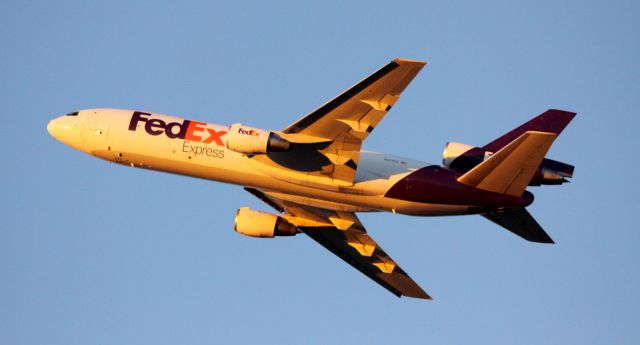 McDonnell Douglas DC-10 (N375FE) - Departure from 30L, as he turns East, 8-29-2012