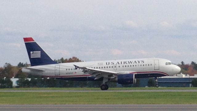 Airbus A319 (N737US) - A US Airways A319 lands on runway 19 in Albany after coming up from Charlotte.