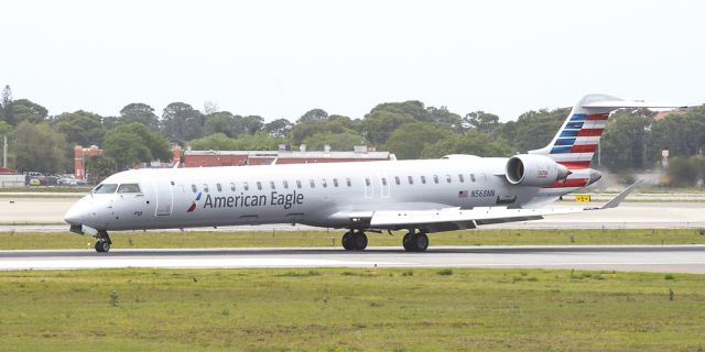 Canadair Regional Jet CRJ-900 (N568NN) - American Eagle just after a gusty landing in KSRQ on Easter Sunday 2016.br /To get a copy of this image go to NotableImages.US