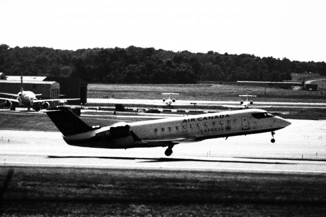 Canadair Regional Jet CRJ-200 (C-FEJA) - *CAMERA FILTER USED* Air Canada Express CRJ 200 departing for Toronto!