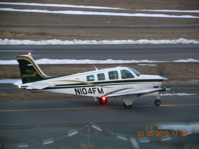 Beechcraft Bonanza (36) (N104FM) - N104FM taxiing to the hangar after landing on 32