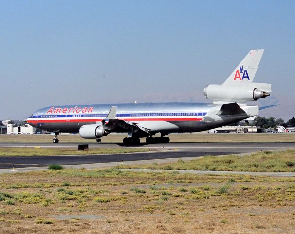 Boeing MD-11 (N1750B) - KSJC - mid 1990s American Airlines MD-11 set to depart Runway 30L at San Jose,CA for Tokyo-Narita.