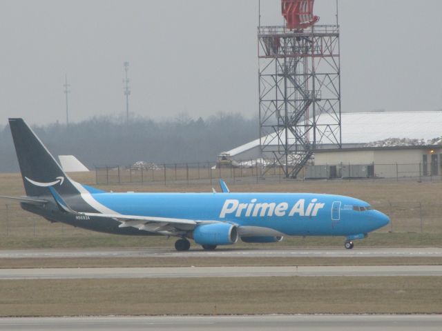 Boeing 737-700 (N5693A) - Sun Country Airlines in a Prime Air livery taxiing at CVG airport.