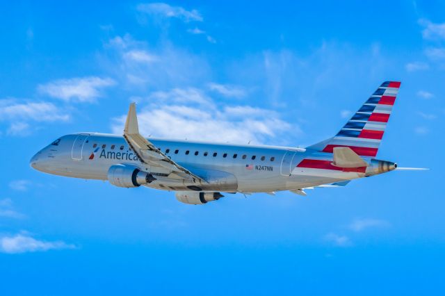 Embraer 175 (N247NN) - An American Eagle ERJ175 taking off from PHX on 2/11/23 during the Super Bowl rush. Taken with a Canon R7 and Canon EF 100-400 II L lens.