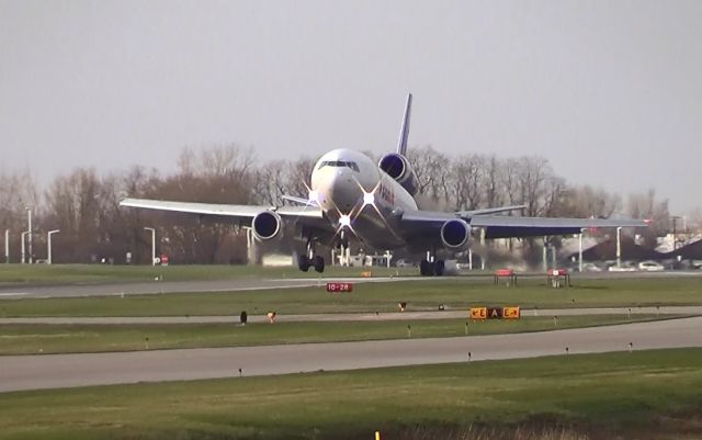 McDonnell Douglas DC-10 — - Just like the famous FedEx DC-10 photo, this one I also on its side! Only not as good. ;)