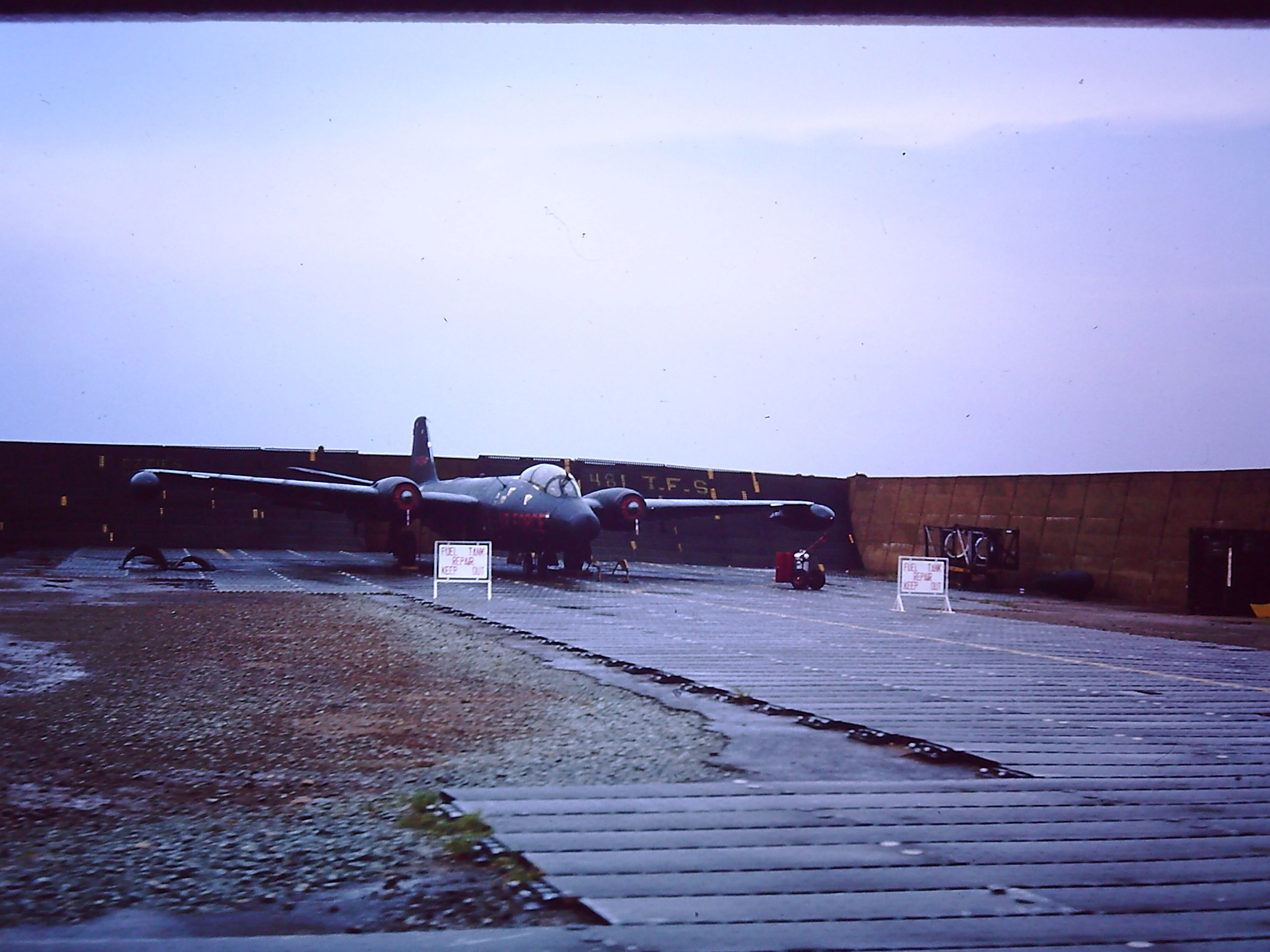 — — - TAN SON NHUT AIR BASE, SAIGON, VIETNAM 1966.  I believe this is an RB-57 and the sign said Fuel tank repair stay out.  I dont recall the 57s being based there when I was (1966)? 